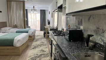 Superior Studio, Pool View | 1 bedroom, in-room safe, soundproofing, free WiFi