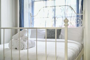 1 habitación, tabla de planchar con plancha, wifi y ropa de cama 