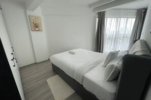 2 chambres, fer et planche à repasser, Wi-Fi, draps fournis