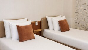 Family Quadruple Room, Garden View | In-room safe, desk, soundproofing, iron/ironing board - Le Macaron Garden Stay - Boutique Hotel Da Lat (Cam Ly - Da Lat)