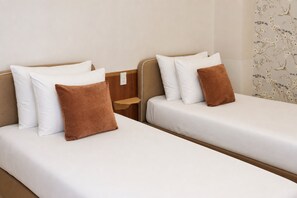 Family Quadruple Room, Garden View | In-room safe, desk, soundproofing, iron/ironing board - Le Macaron Garden Stay - Boutique Hotel Da Lat (Da Lat)