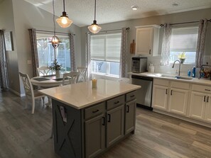 Fridge, microwave, oven, stovetop - Modern Open-Plan Home w/ Updated Kitchen, Private Lanai & Golf Cart (The Villages)