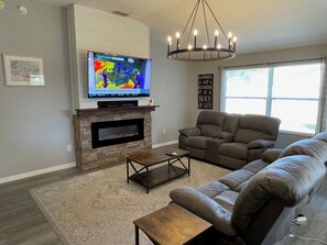 Smart TV, fireplace - Modern Open-Plan Home w/ Updated Kitchen, Private Lanai & Golf Cart (The Villages)