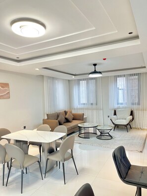 In-room safe, desk, laptop workspace, iron/ironing board - Step Apart Hotel (Kigali)