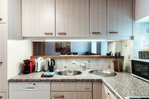 Espresso maker, electric kettle, highchair, spices