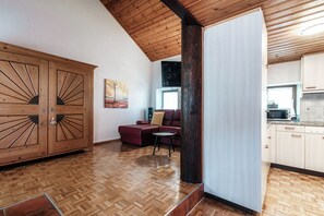 32-inch flat-screen TV with satellite channels