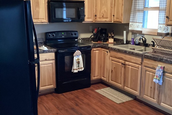 Microondas, horno, placa de cocina