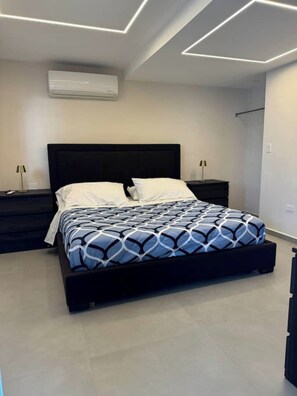 1 bedroom, desk, iron/ironing board, travel cot