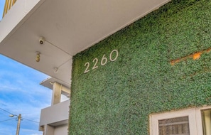 Stunning building facade with a lush, leafy exterior design, located at 2260.