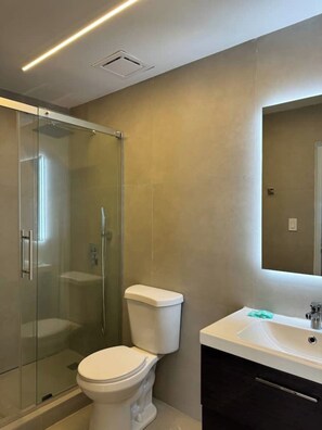 Shower, towels, soap, shampoo