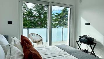 Apartamento superior, 2 quartos, vista para o mar | 2 quartos, cofres nos quartos, quartos à prova de som