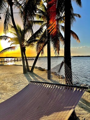 On the beach, sun loungers, beach towels