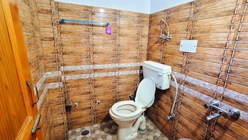 Deluxe Double Room, Valley View | Bathroom | Shower, slippers, towels, soap