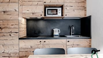 Appartement | 1 slaapkamer, een minibar, een kluis op de kamer, een bureau