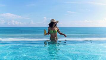 5 outdoor pools, cabanas (surcharge), pool umbrellas