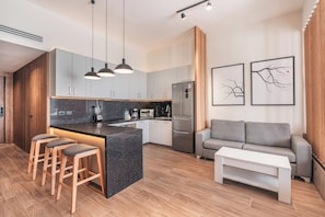 Junior Studio, Patio, Courtyard View | Living area | 55-inch Smart TV with cable channels - Probar Suites Punta Cana (Punta Cana)