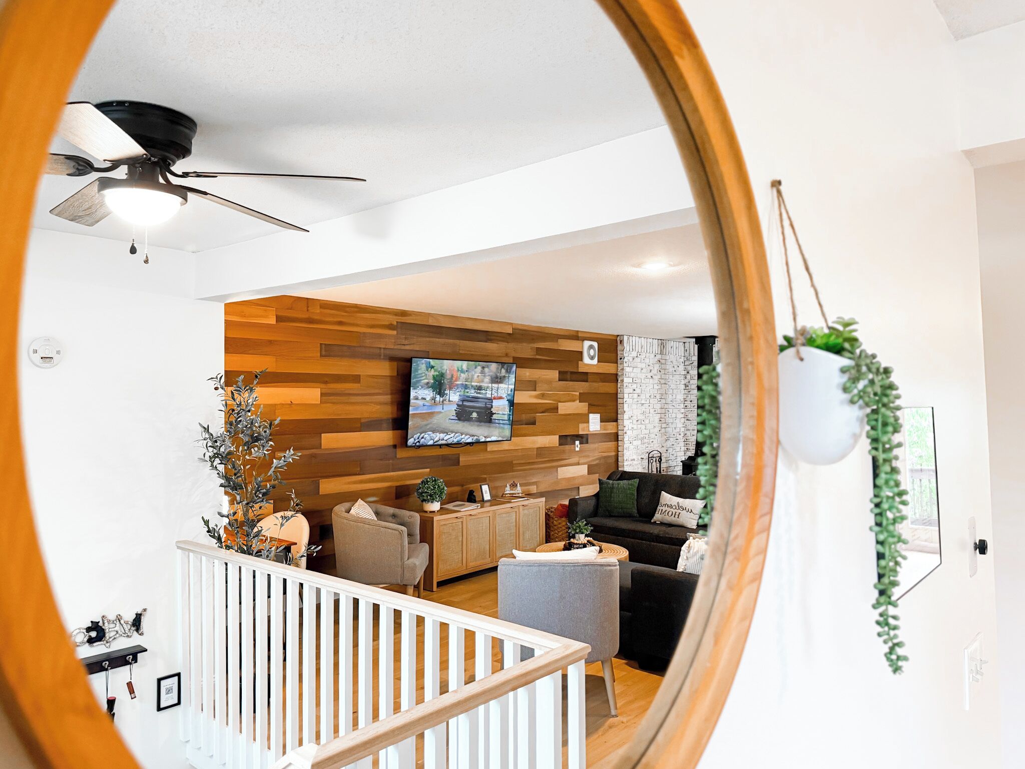 Smart TV, fireplace, books, printers