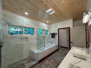 Jetted tub, hair dryer, towels, soap