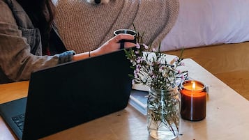 1 bedroom, desk, laptop workspace, bed sheets