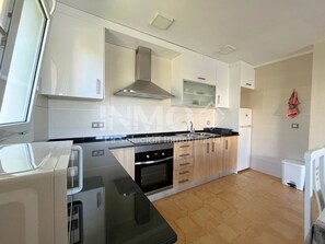 Fridge, microwave, oven, coffee/tea maker