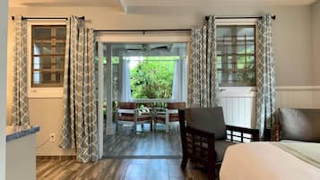 Fish Tail Palm Premium King Suite, 1King bed, Large Patio area in Garden, Ground Floor | 1 bedroom, individually decorated, individually furnished
