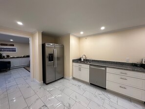 Family Room | Private kitchen | Mini-fridge, microwave, coffee/tea maker, cookware/dishes/utensils - Downtown Camden Hotel (Camden)
