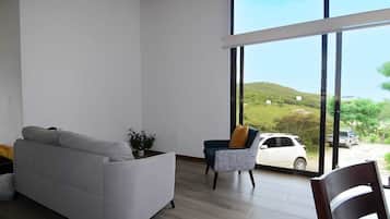 Basic House, Balcony, Mountain View | Living area