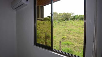 Basic House, Balcony, Mountain View | 2 bedrooms, down duvets, blackout curtains, travel cot