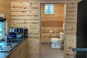 Cabin, 1 Queen Bed | Bathroom | Shower, towels, soap, shampoo