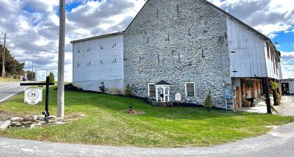 Spacious SIgnature Suite on country farmland and a beautiful farmland view from windows and front porch