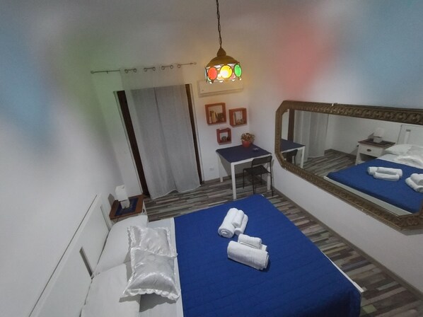 1 bedroom, desk, iron/ironing board, travel cot