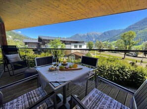 Enjoy a romantic meal on the balcony with breathtaking views of the surrounding mountains.