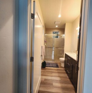 Shower, eco-friendly toiletries, hair dryer, towels