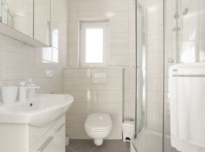 Ducha, secador de pelo, toallas