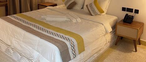 Premium bedding, down duvets, memory-foam beds, individually furnished