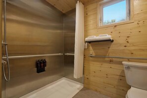 Regadera, toallas, jabón, shampoo 