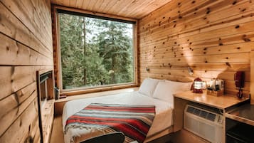 1 bedroom, desk, laptop workspace, bed sheets