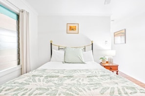 1 bedroom, desk, iron/ironing board, travel crib