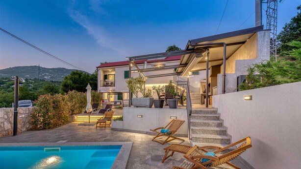 A two-story house with a swimming pool, outdoor seating, and a staircase leading to the upper floor. - Villa Leticia Crikvenica Riviera (Hreljin)