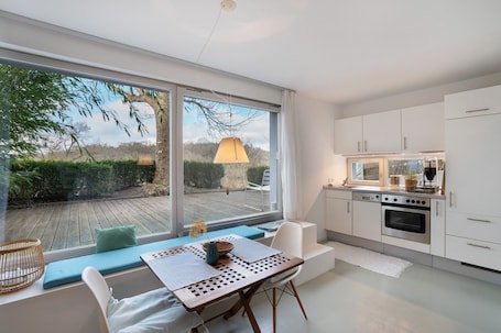 Dining. Apartment 'Modernes Ammersee' with Private Terrace, Private Garden and Wi-Fi