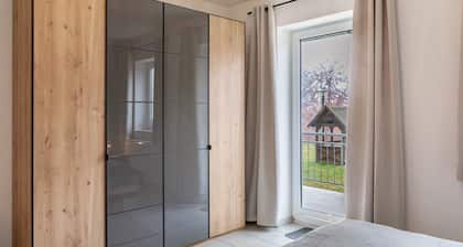 Ferienwohnung Tannenblick 2-1" mit Gemeinschaftsgarten, Balkon und Wi-Fi