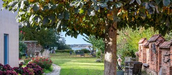 Studio 'Fewo Inselblick - Am Schweriner See' avec vue sur le lac, terrasse privée et Wi-Fi