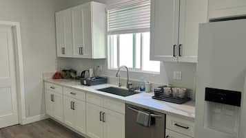 Basic Shared Dormitory, Patio | Private kitchen | Fridge, microwave, oven, stovetop