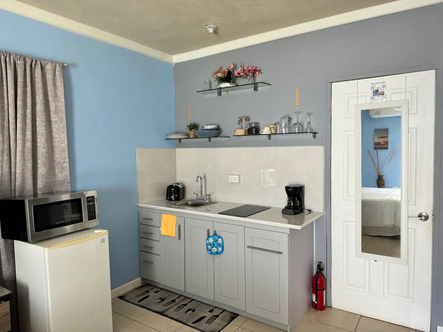 Fridge, microwave, stovetop, coffee/tea maker