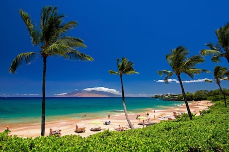 On the beach, white sand, beach towels