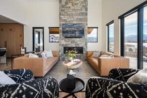 Smart TV, fireplace, table football, music library