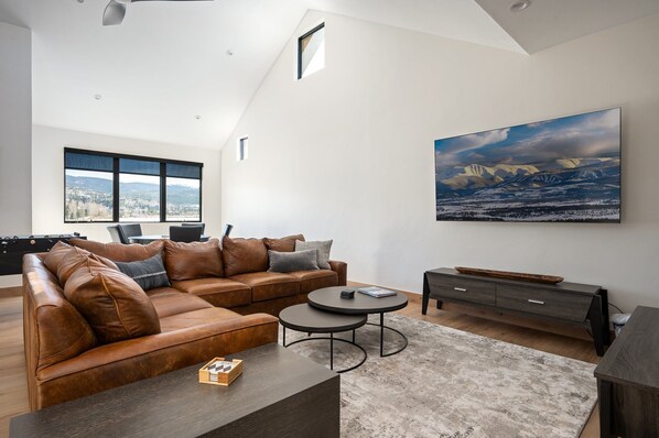 Smart TV, fireplace, foosball, music library