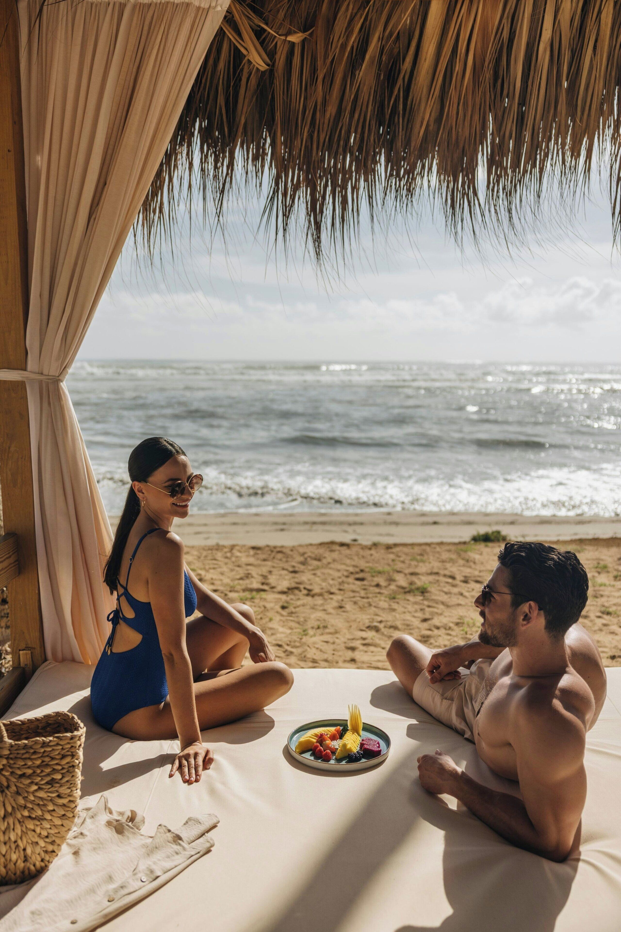 On the beach, beach cabanas, sun-loungers, beach umbrellas