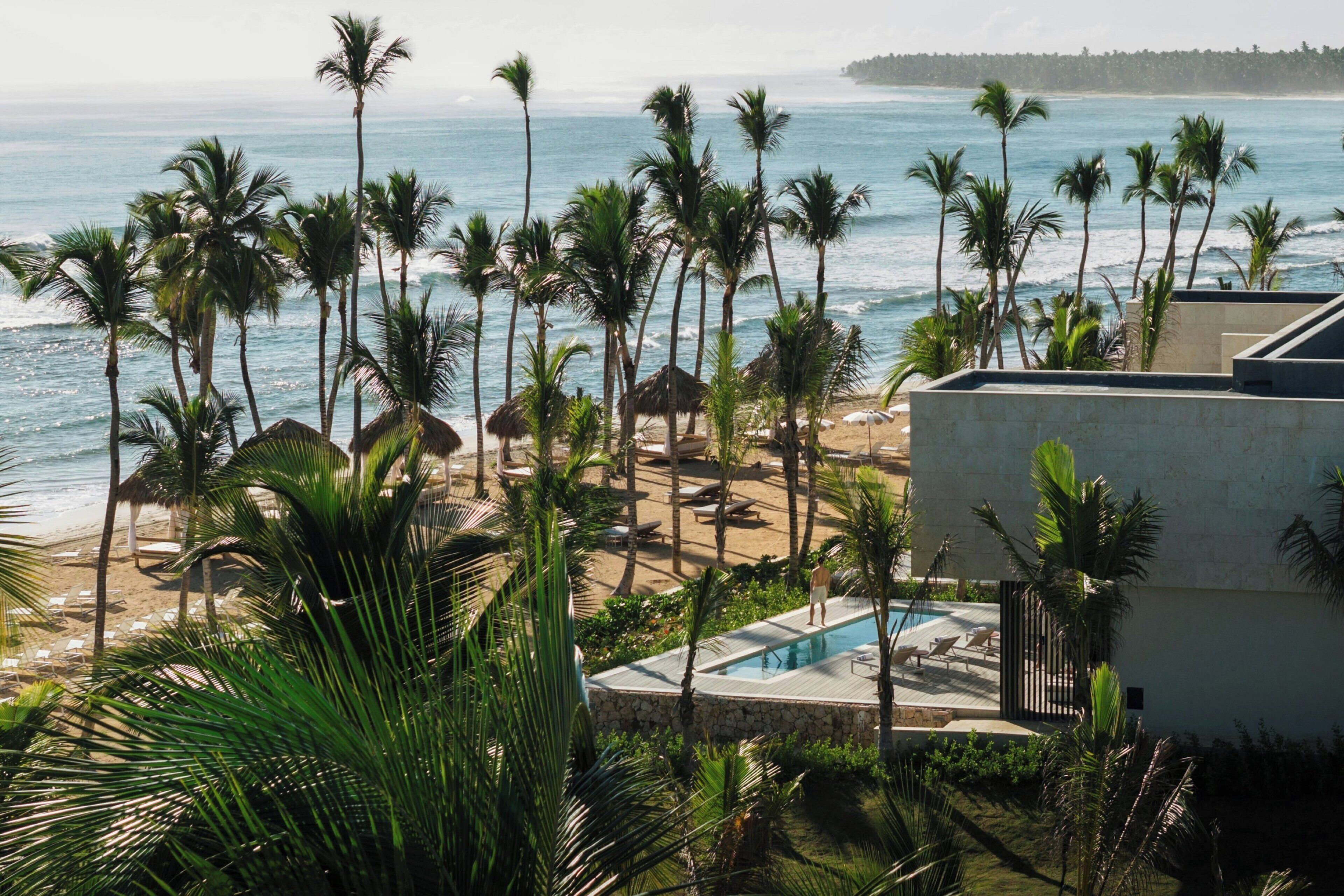 On the beach, beach cabanas, sun loungers, beach umbrellas