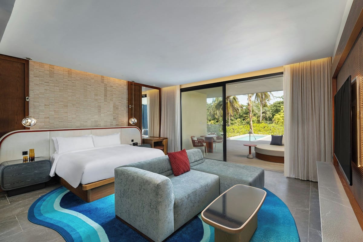 Premium bedding, pillowtop beds, minibar (free items), in-room safe